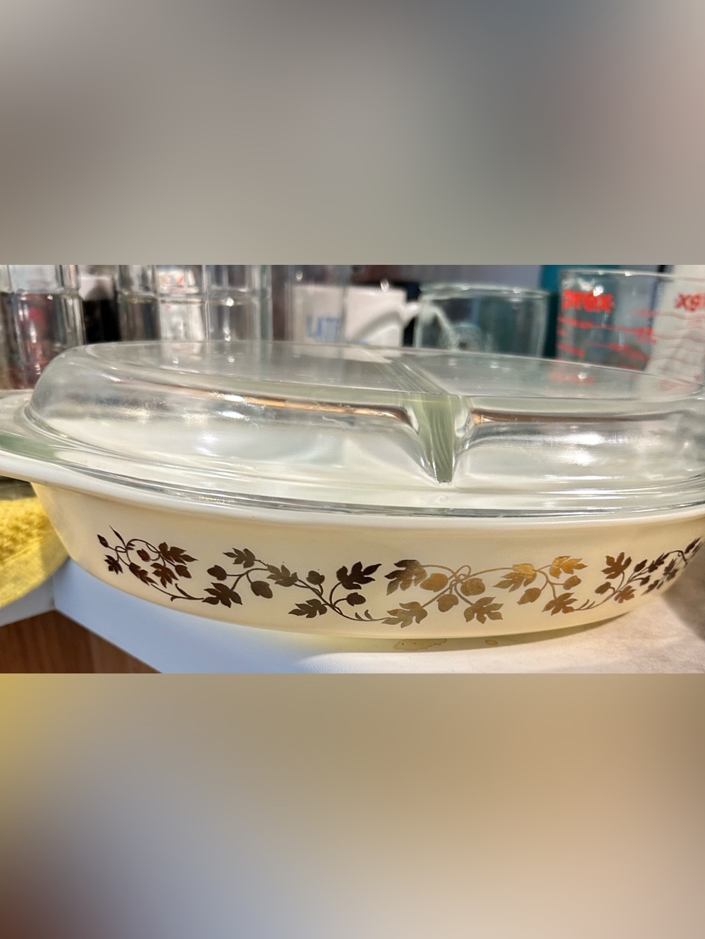 Pyrex Golden Acorn Divided Casserole Dish with its original glass lid